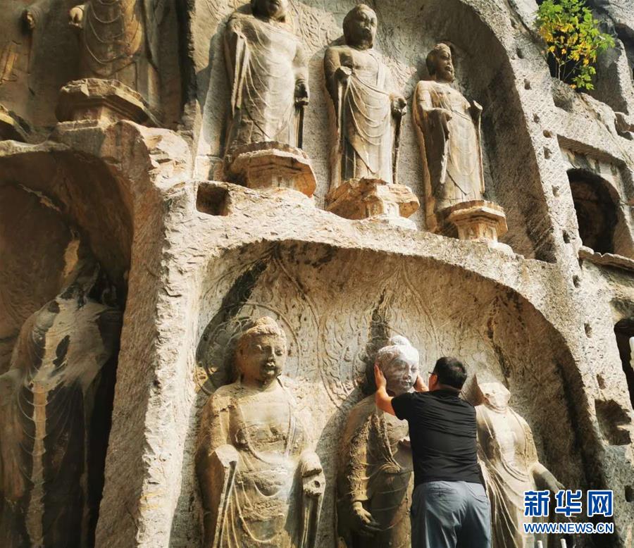 （圖文互動）（4）合體了，龍門石窟流散佛首首次實現(xiàn)“數(shù)字復(fù)位”