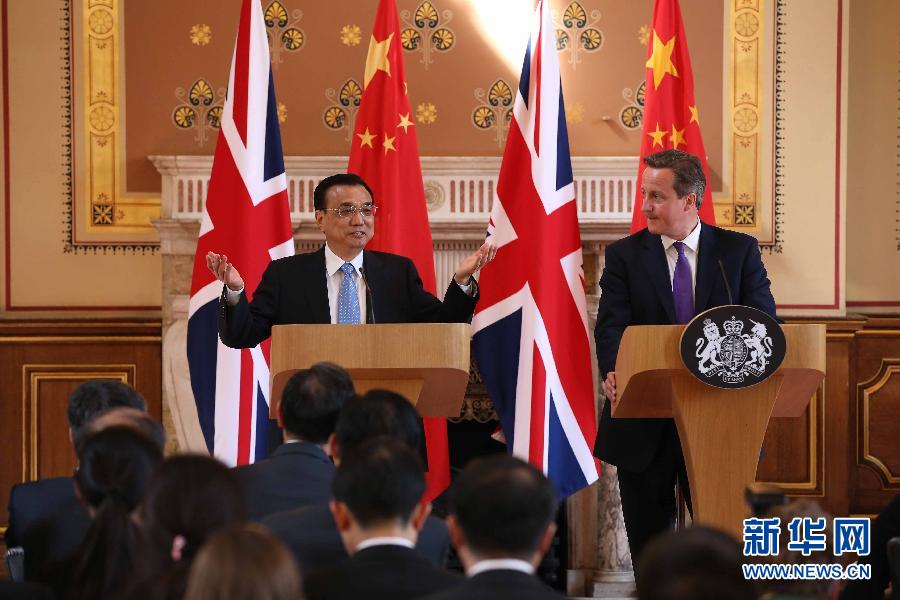 6月17日，國務(wù)院總理李克強同英國首相卡梅倫在倫敦舉行中英總理年度會晤后共同會見記者。新華社記者 龐興雷 攝