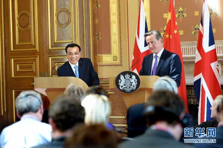 6月17日，中國國務(wù)院總理李克強同英國首相卡梅倫在倫敦舉行中英總理年度會晤后共同會見記者。新華社記者 李濤 攝