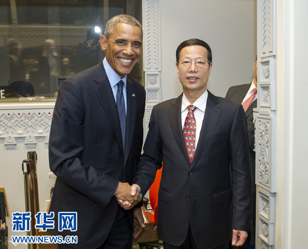 9月23日，國家主席習(xí)近平特使、國務(wù)院副總理張高麗在紐約會見出席聯(lián)合國氣候峰會的美國總統(tǒng)奧巴馬。 新華社記者王曄攝