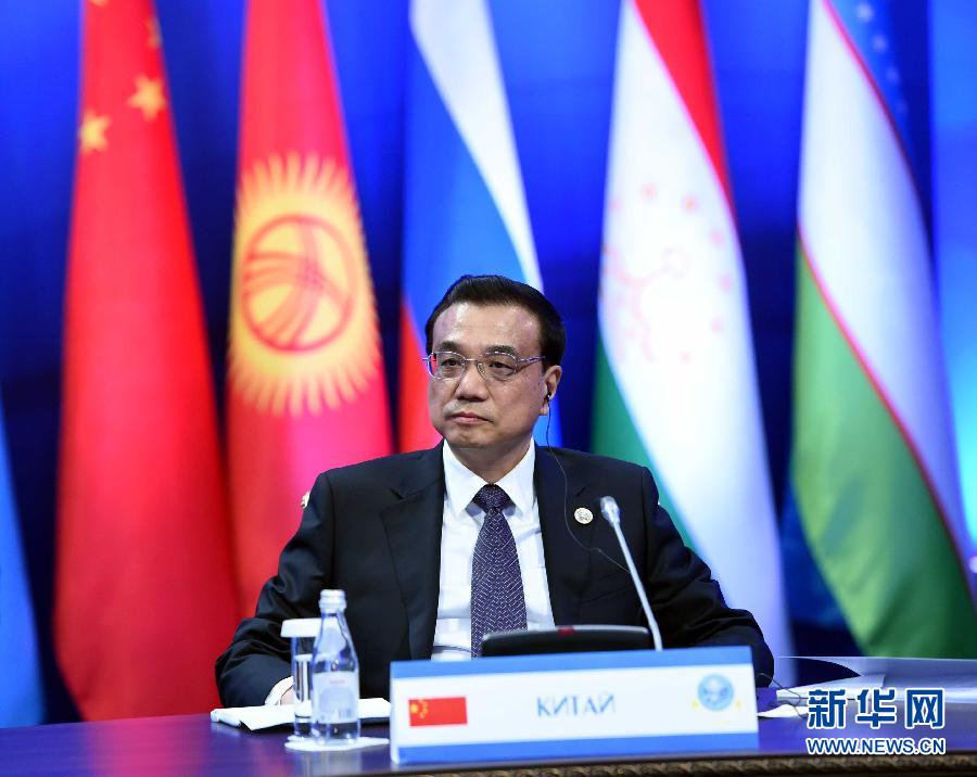 12月15日，中國國務院總理李克強在阿斯塔納出席上海合作組織成員國政府首腦理事會第十三次會議。 新華社記者 饒愛民 攝 