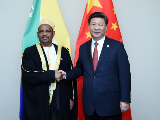 12月4日，國家主席習(xí)近平在約翰內(nèi)斯堡會(huì)見科摩羅總統(tǒng)伊基利盧。 新華社記者 張鐸 攝 

