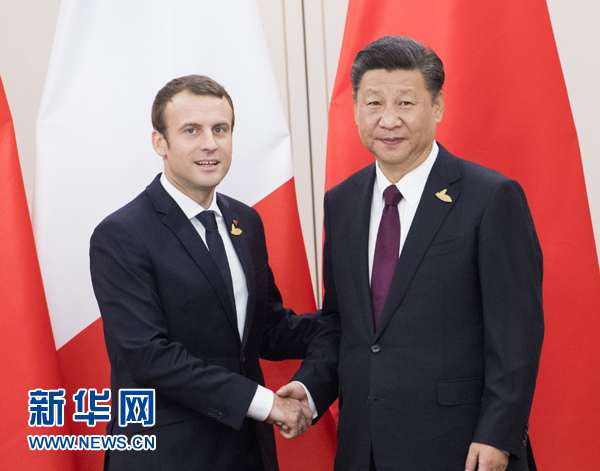 7月8日，國家主席習近平在漢堡會見法國總統(tǒng)馬克龍。新華社記者 李學仁 攝
